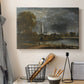 Canvas art print detailing a scenic composition with cathedral, displayed in a softly lit workspace setting