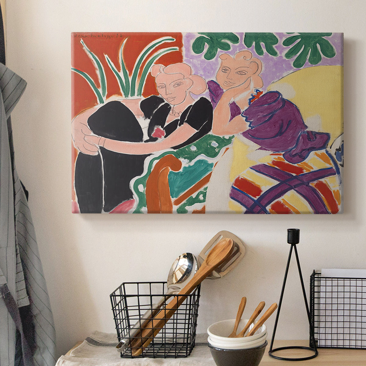 Canvas art print detailing a stylized depiction of a conversation in a colorful room, displayed in a softly lit workspace setting