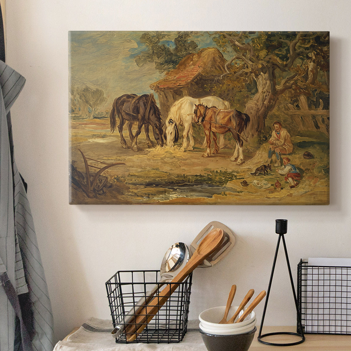 Canvas art print detailing a rustic depiction of animals grouped around food, displayed in a softly lit workspace setting