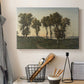 Canvas art print detailing an atmospheric autumn setting with warm tones and calm mood, displayed in a softly lit workspace setting