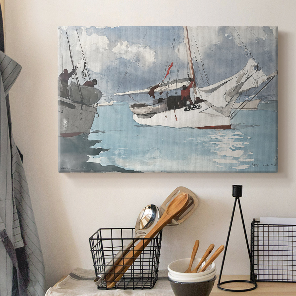 Canvas art print detailing a shoreline view with fishing boats and distant horizon, displayed in a softly lit workspace setting