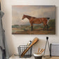Canvas art print detailing a rural setting with figure and horse, displayed in a softly lit workspace setting