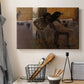 Canvas art print detailing a stylized depiction of ancient culture with detailed surroundings, displayed in a softly lit workspace setting