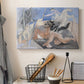 Canvas art print detailing a stylized mythological subject, displayed in a softly lit workspace setting