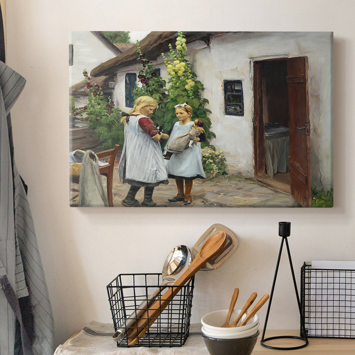 Canvas art print detailing a farmhouse exterior with figures engaged in everyday moment, displayed in a softly lit workspace setting