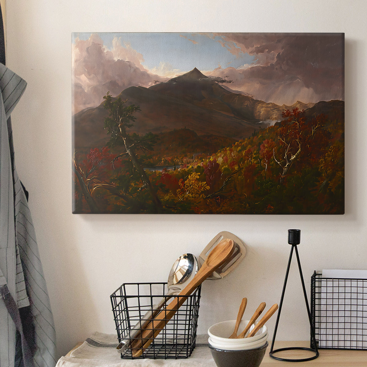 Canvas art print detailing a landscape emphasizing atmosphere and depth, displayed in a softly lit workspace setting