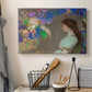 Canvas art print detailing a stylized portrait blending figure and abstraction, displayed in a softly lit workspace setting