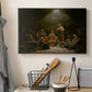 Canvas art print detailing a traditional devotional scene of community worship inside farmhouse, displayed in a softly lit workspace setting
