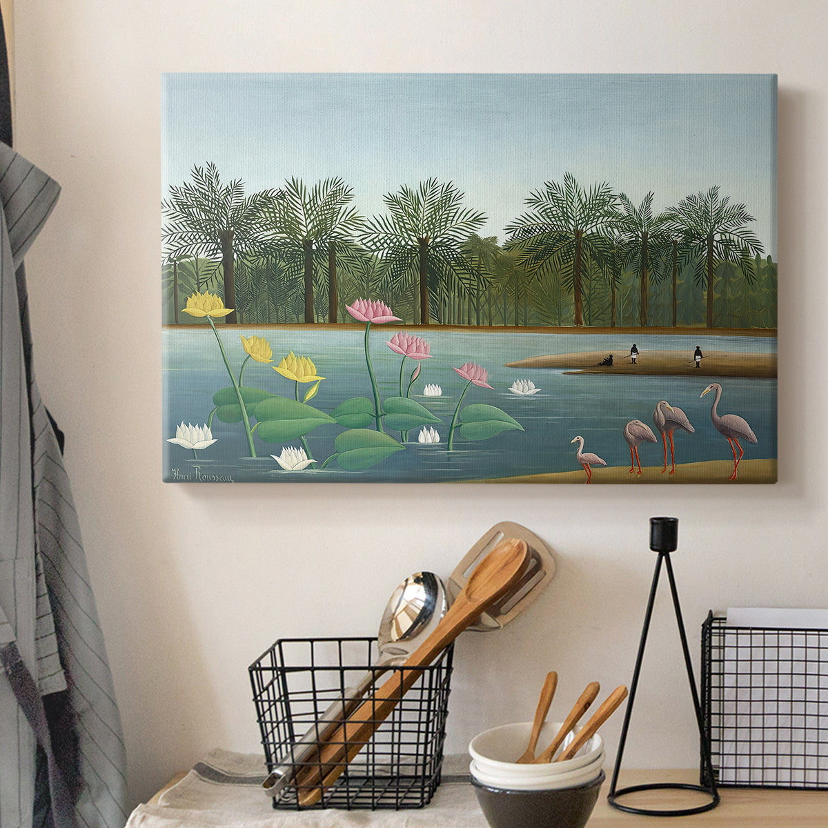 Canvas art print detailing a tropical landscape featuring birds and greenery, displayed in a softly lit workspace setting