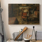 Canvas art print detailing a quiet workspace with figure engaged in artistic task, displayed in a softly lit workspace setting
