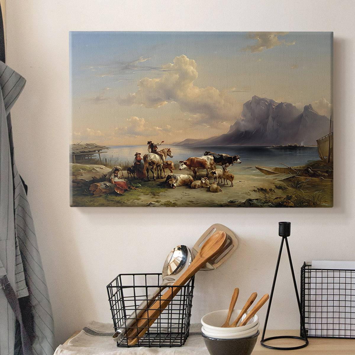Canvas art print detailing a countryside composition with herd near lakeshore, displayed in a softly lit workspace setting