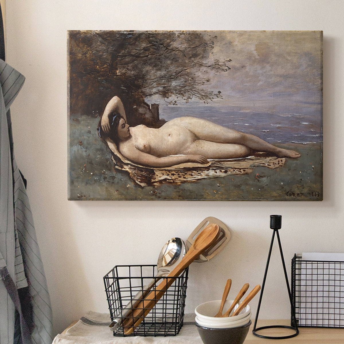 Canvas art print detailing a romantic scene combining human figure and shoreline, displayed in a softly lit workspace setting