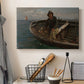 Canvas art print detailing a maritime scene with people working on water, displayed in a softly lit workspace setting