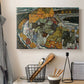 Canvas art print detailing an architectural scene with houses arranged in curved composition, displayed in a softly lit workspace setting
