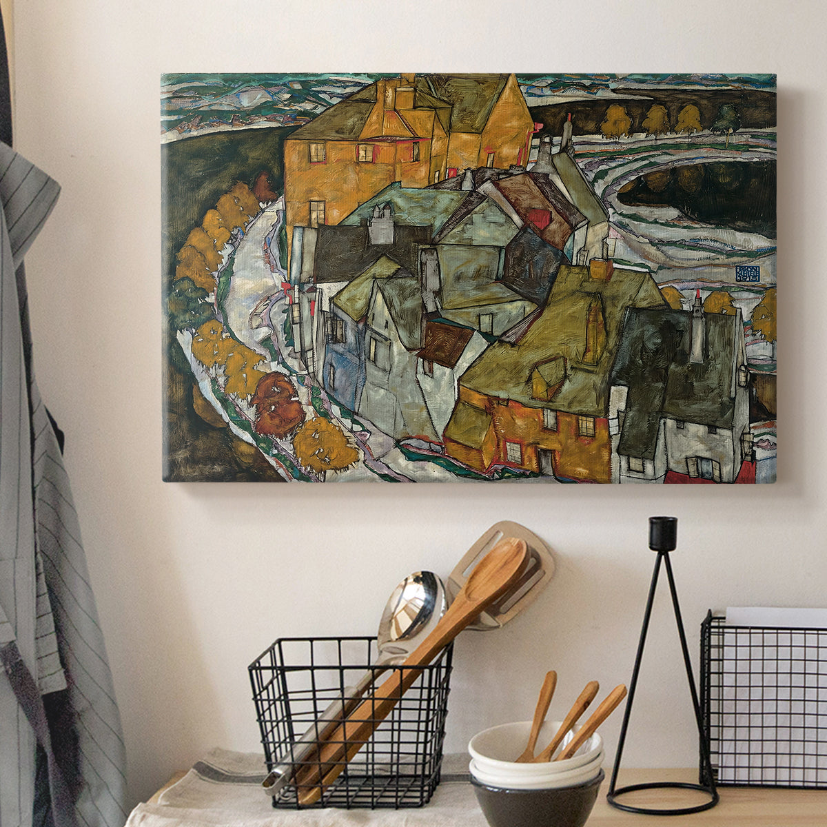 Canvas art print detailing an architectural scene with houses arranged in curved composition, displayed in a softly lit workspace setting