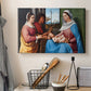 Canvas art print detailing a classical scene with people posed in harmonious outdoor setting, displayed in a softly lit workspace setting