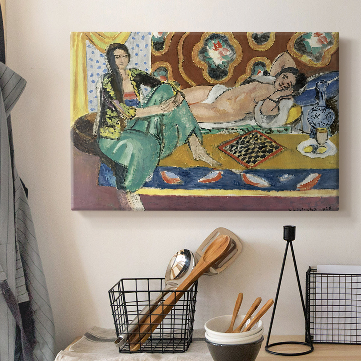 Canvas art print detailing a stylized domestic scene with women and checkers, displayed in a softly lit workspace setting