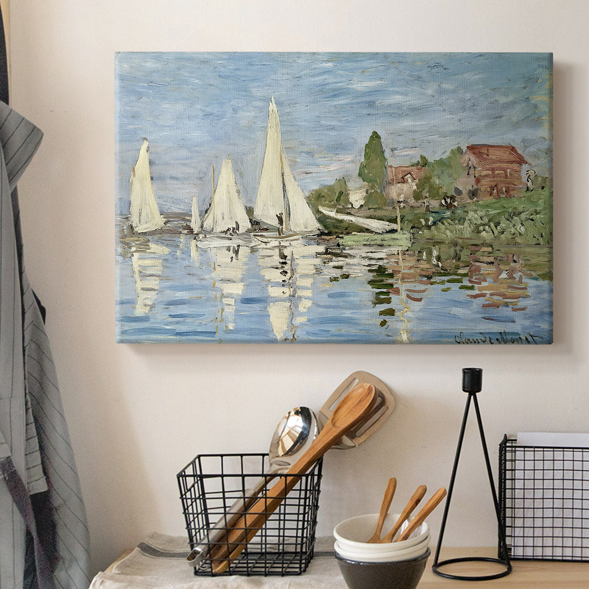 Canvas art print detailing a dynamic nautical scene with boats moving across river, displayed in a softly lit workspace setting