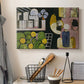 Canvas art print detailing a stylized interior-exterior scene, displayed in a softly lit workspace setting