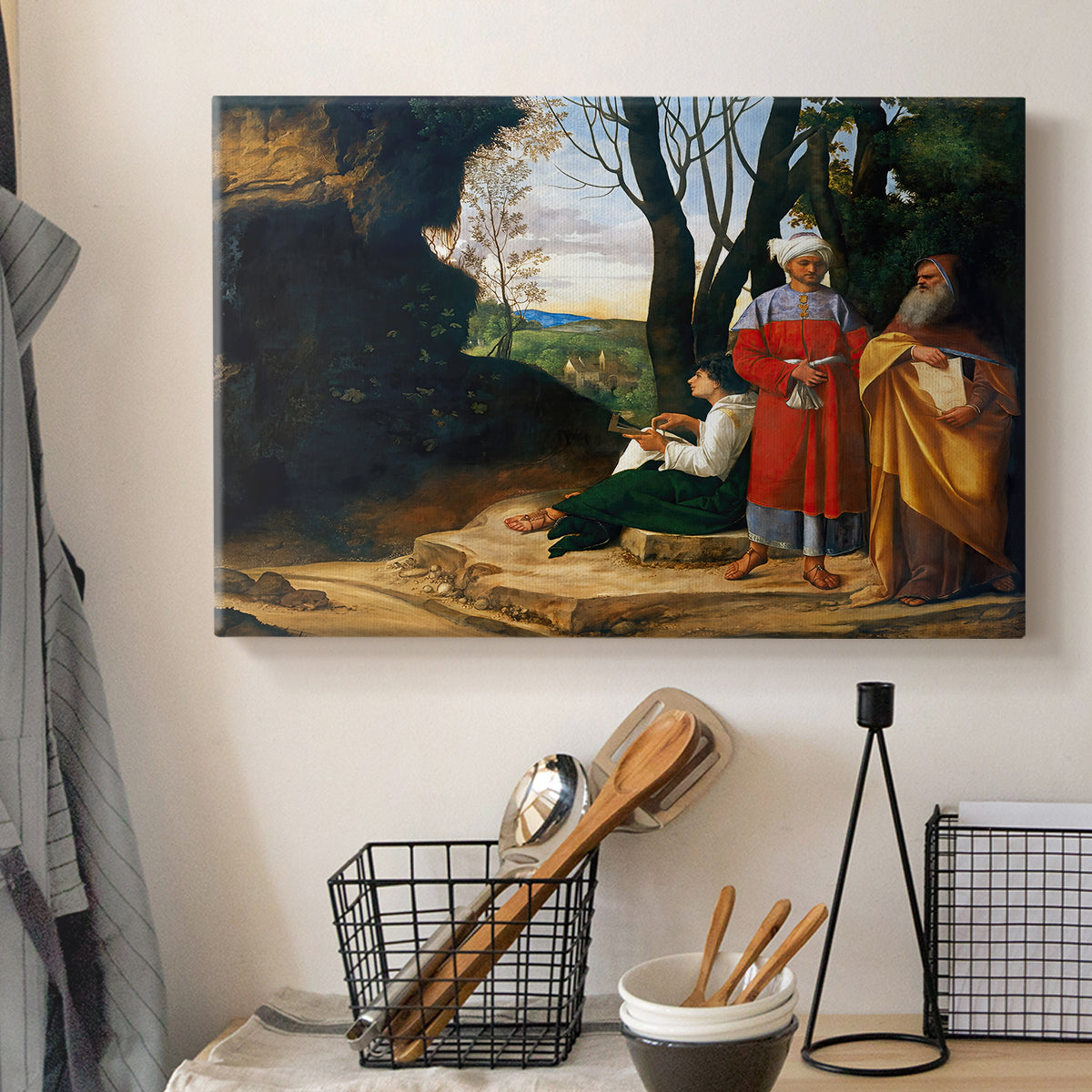 Canvas art print detailing a classical composition of thinkers gathered in outdoor environment, displayed in a softly lit workspace setting