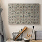Canvas art print detailing an elongated surface filled with structured ornamental pattern, displayed in a softly lit workspace setting