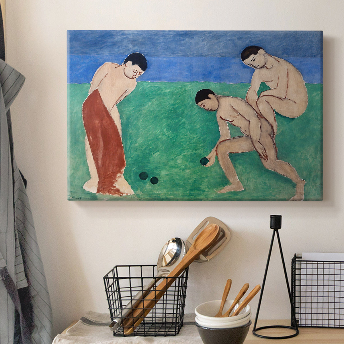 Canvas art print detailing a Fauvist composition of bowl players in a landscape, displayed in a softly lit workspace setting