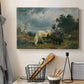 Canvas art print detailing a realistic field with animals, displayed in a softly lit workspace setting