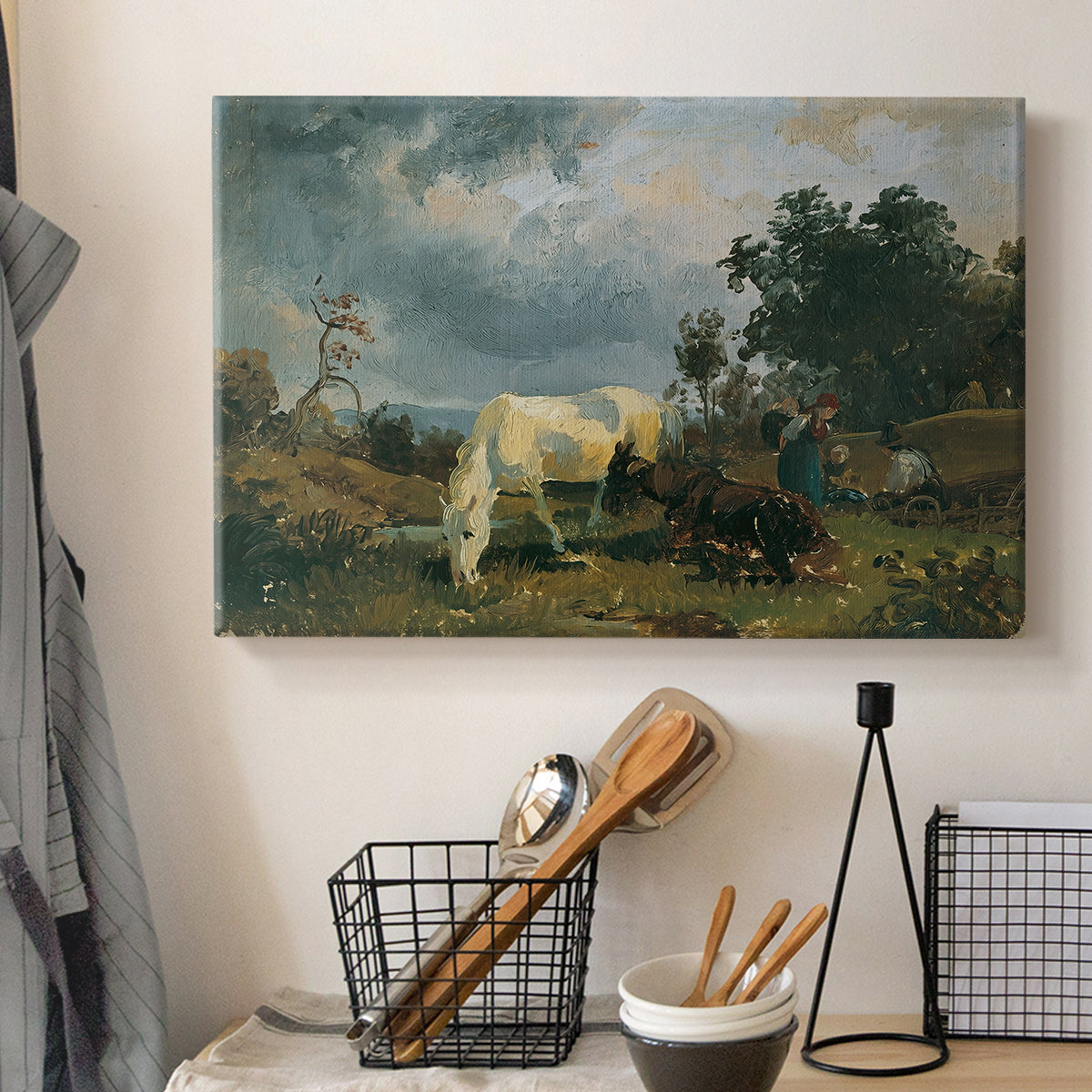 Canvas art print detailing a realistic field with animals, displayed in a softly lit workspace setting