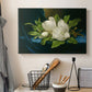 Canvas art print detailing a luminist still life highlighting flowers, displayed in a softly lit workspace setting