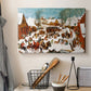 Canvas art print detailing a historical tragedy scene in a village, displayed in a softly lit workspace setting