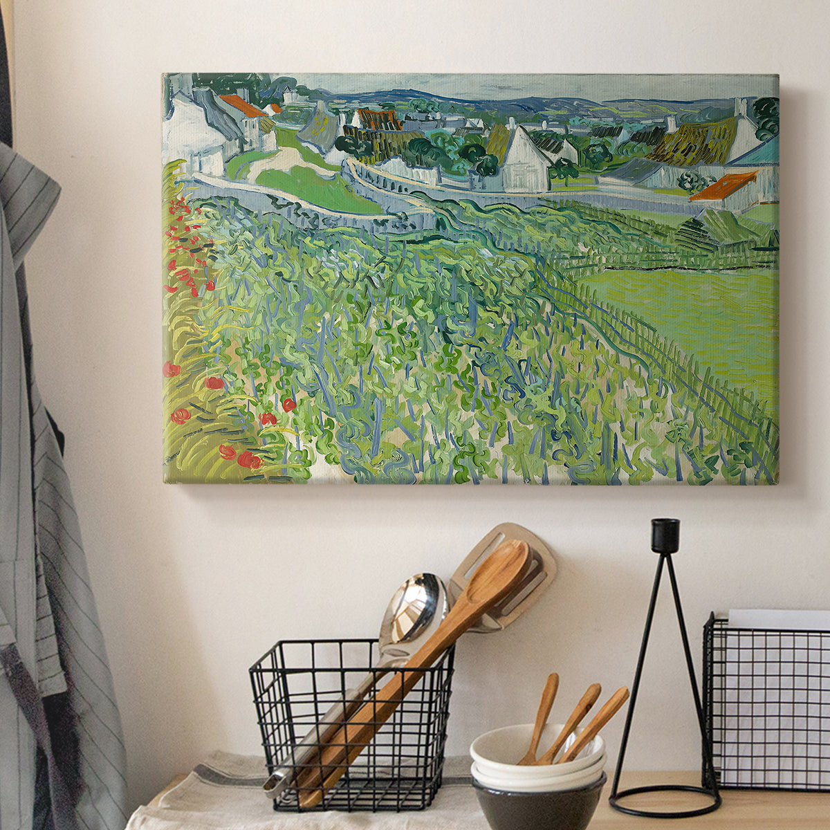 Canvas art print detailing a stylized vineyard landscape with depth, displayed in a softly lit workspace setting