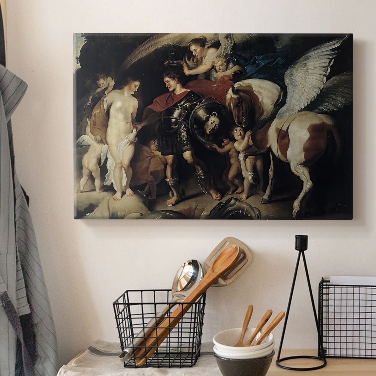 Canvas art print detailing a classical depiction of mythological rescue, displayed in a softly lit workspace setting
