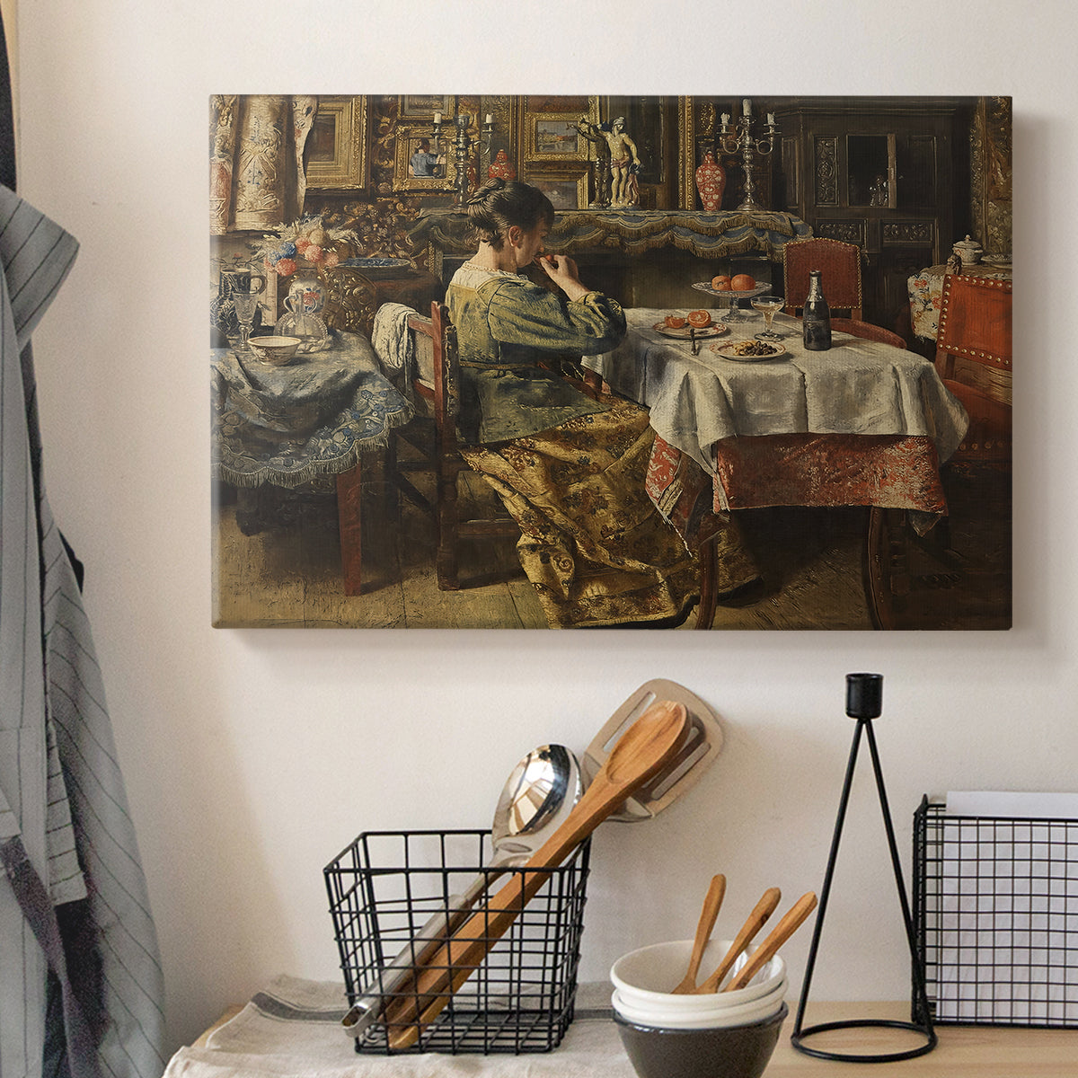 Canvas art print detailing an everyday life scene centered around communal meal, displayed in a softly lit workspace setting