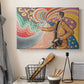 Canvas art print detailing a graphic portrait composition, displayed in a softly lit workspace setting