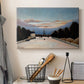 Canvas art print detailing an architectural scene featuring Eiffel Tower and sky, displayed in a softly lit workspace setting