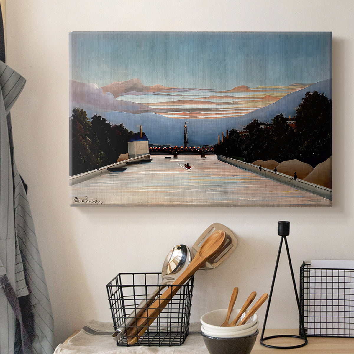Canvas art print detailing an architectural scene featuring Eiffel Tower and sky, displayed in a softly lit workspace setting