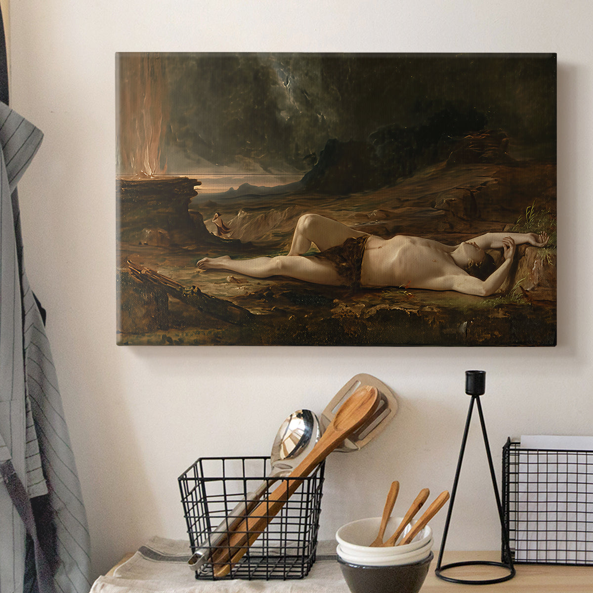 Canvas art print detailing a narrative landscape with solitary figure and muted tones, displayed in a softly lit workspace setting