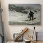 Canvas art print detailing an atmospheric winter landscape with human presence, displayed in a softly lit workspace setting
