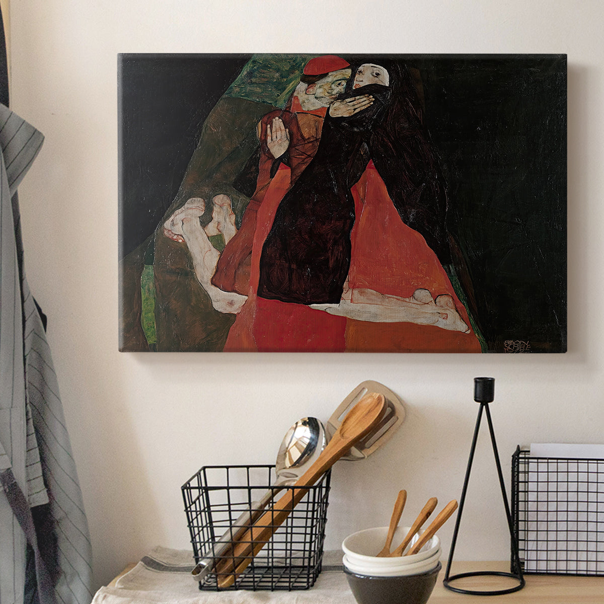 Canvas art print detailing an intimate scene with religious figures in modernist style, displayed in a softly lit workspace setting