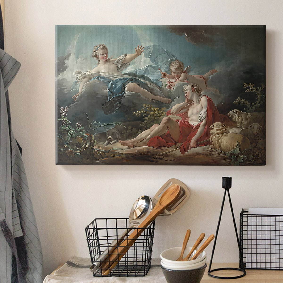 Canvas art print detailing a stylized mythological scene with reclining figure and woman, displayed in a softly lit workspace setting