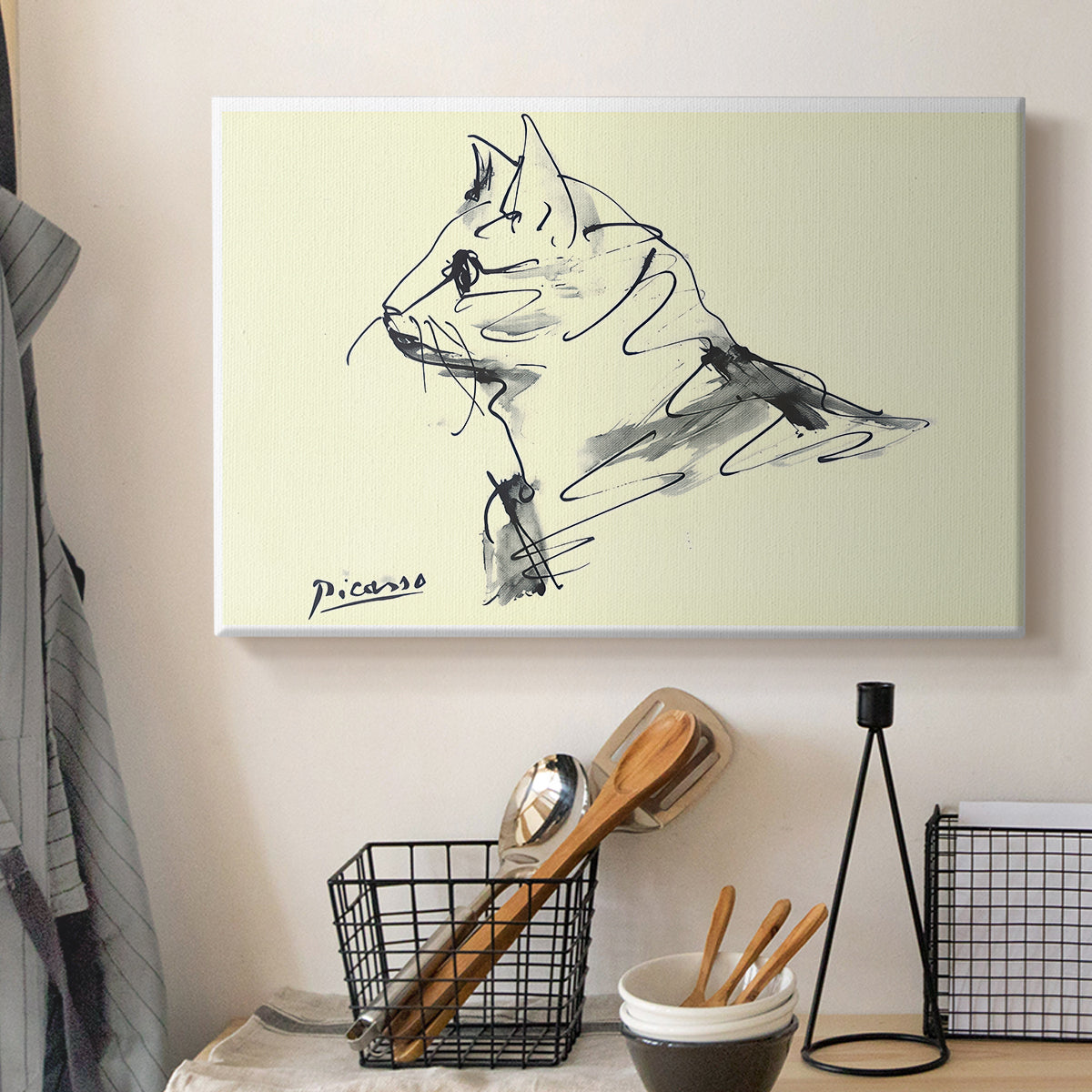Canvas art print detailing an expressive outline drawing of basic cat form, displayed in a softly lit workspace setting