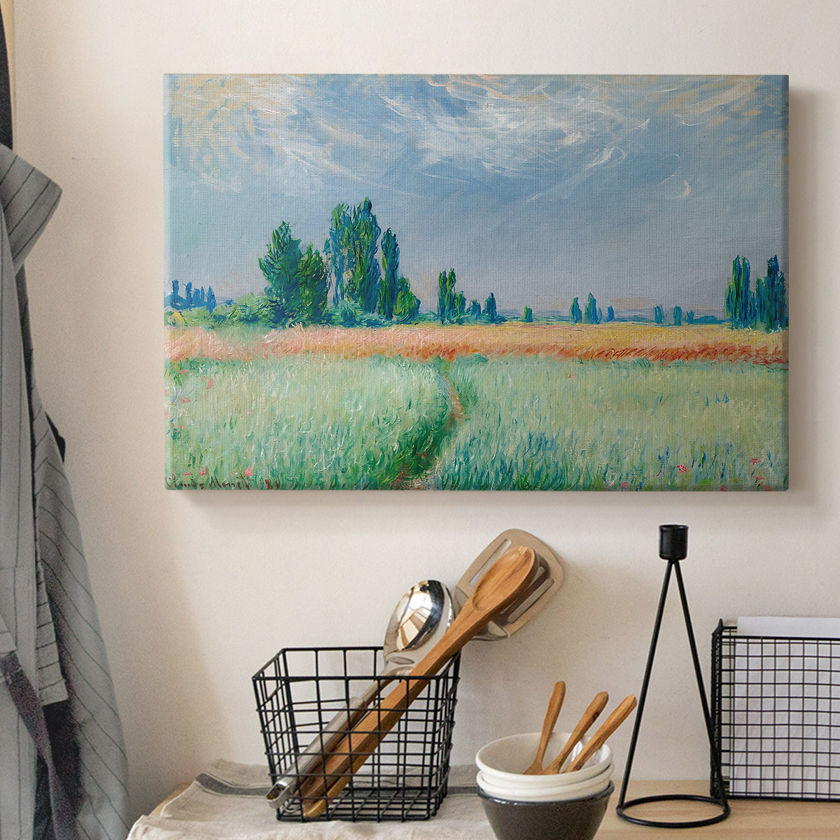 Canvas art print detailing a serene rural scene with textured wheat under natural light, displayed in a softly lit workspace setting