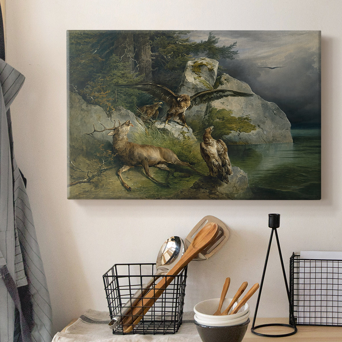 Canvas art print detailing a dramatic lakeside setting with wildlife, displayed in a softly lit workspace setting