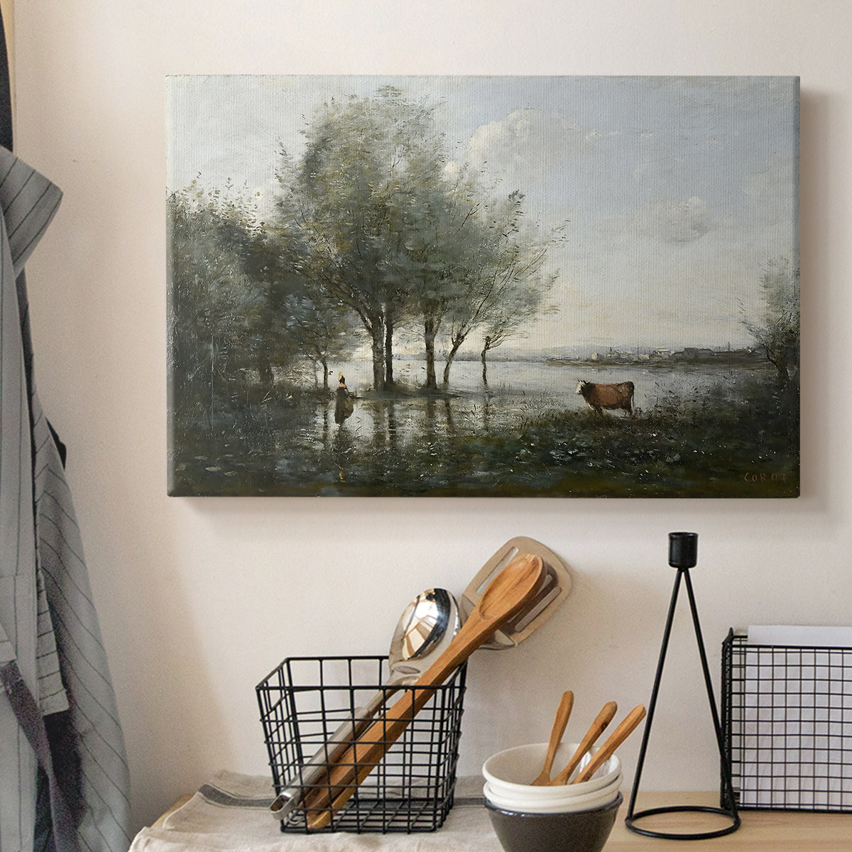Canvas art print detailing an atmospheric natural setting with marsh and soft sky, displayed in a softly lit workspace setting