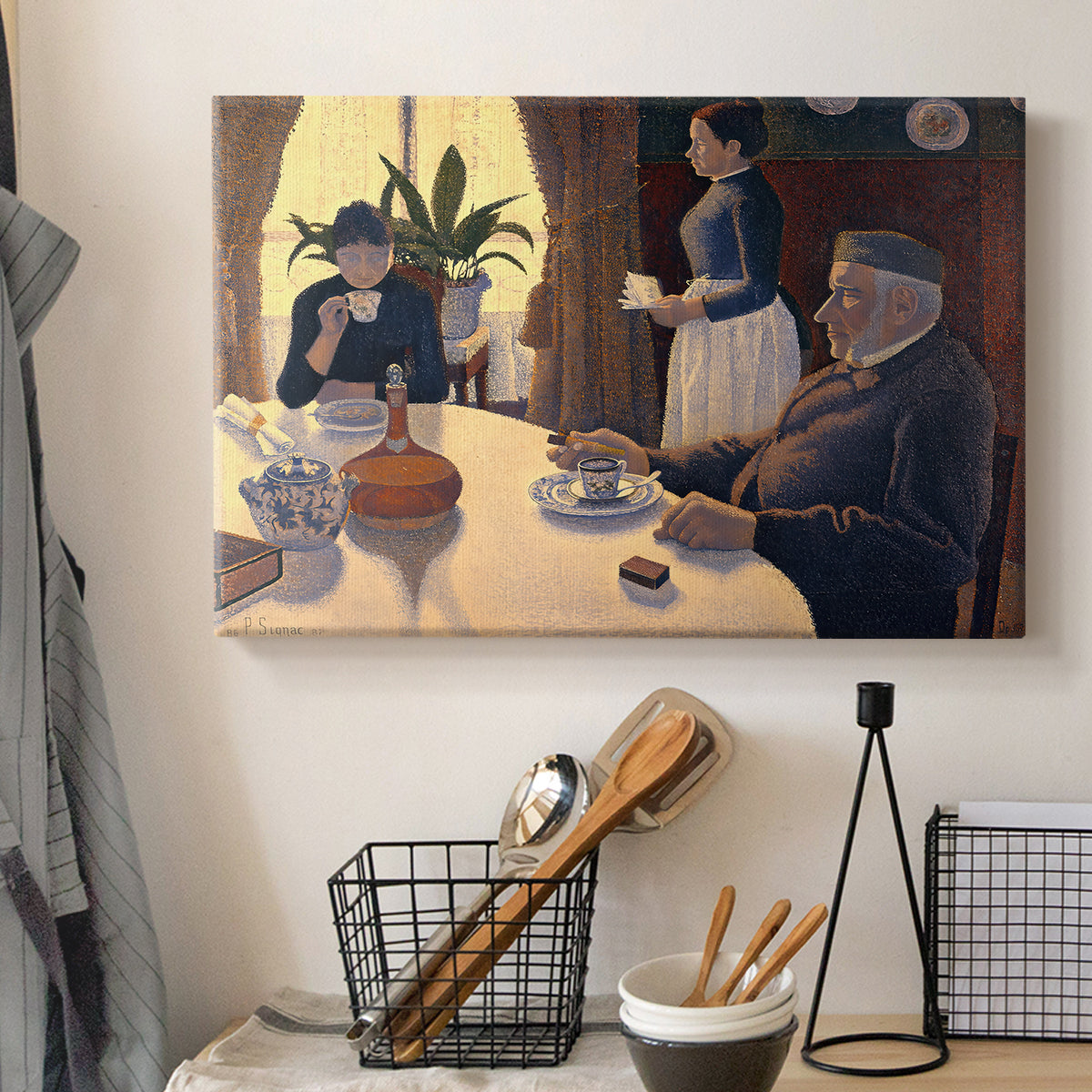 Canvas art print detailing a pointillist social gathering indoors, displayed in a softly lit workspace setting