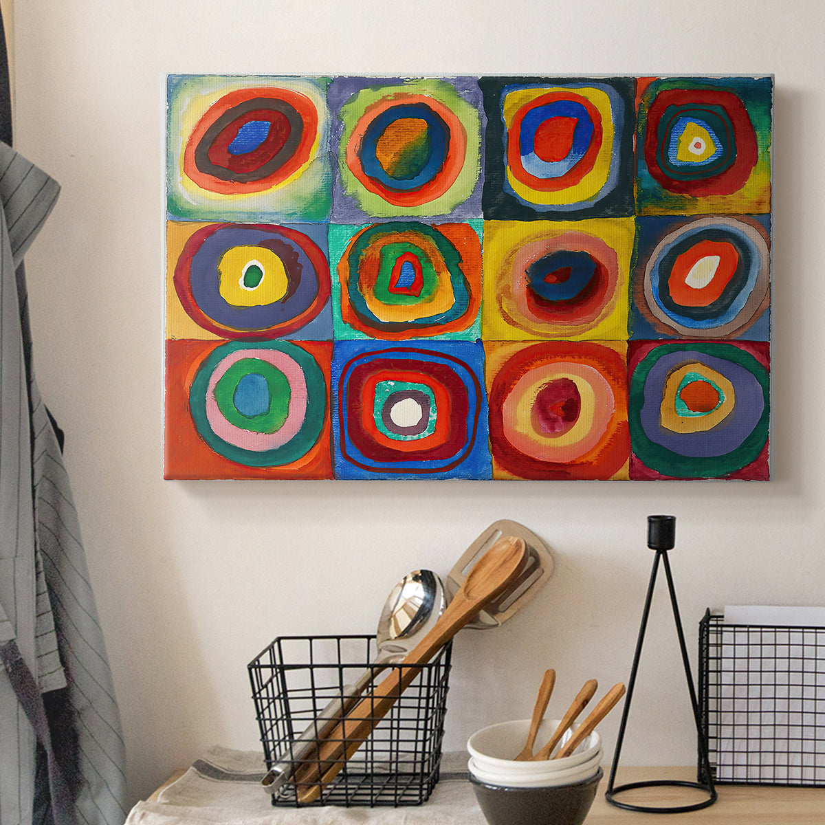 Canvas art print detailing an abstract design focused on color interaction and repetition, displayed in a softly lit workspace setting