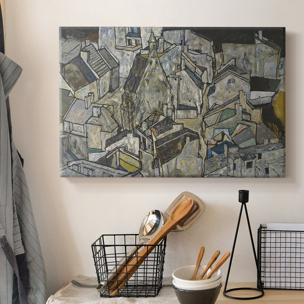 Canvas art print detailing a stylized urban composition with geometric structures and muted tones, displayed in a softly lit workspace setting