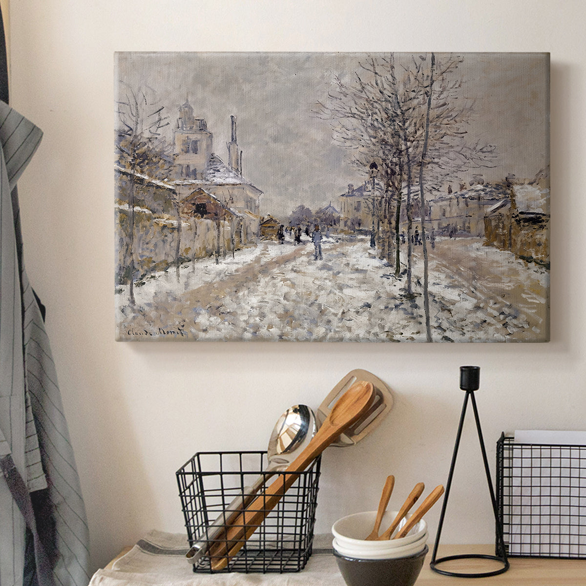 Canvas art print detailing an urban winter landscape with muted tones and soft light, displayed in a softly lit workspace setting