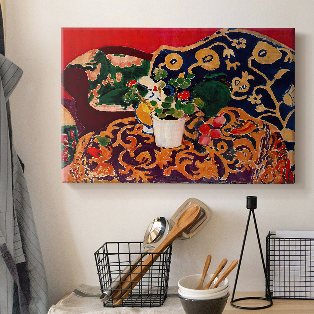 Canvas art print detailing a stylized composition of fruit and tableware, displayed in a softly lit workspace setting
