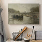 Canvas art print detailing an atmospheric landscape featuring a bridge over water, displayed in a softly lit workspace setting